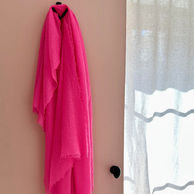 marmee neon pink scarf on door 