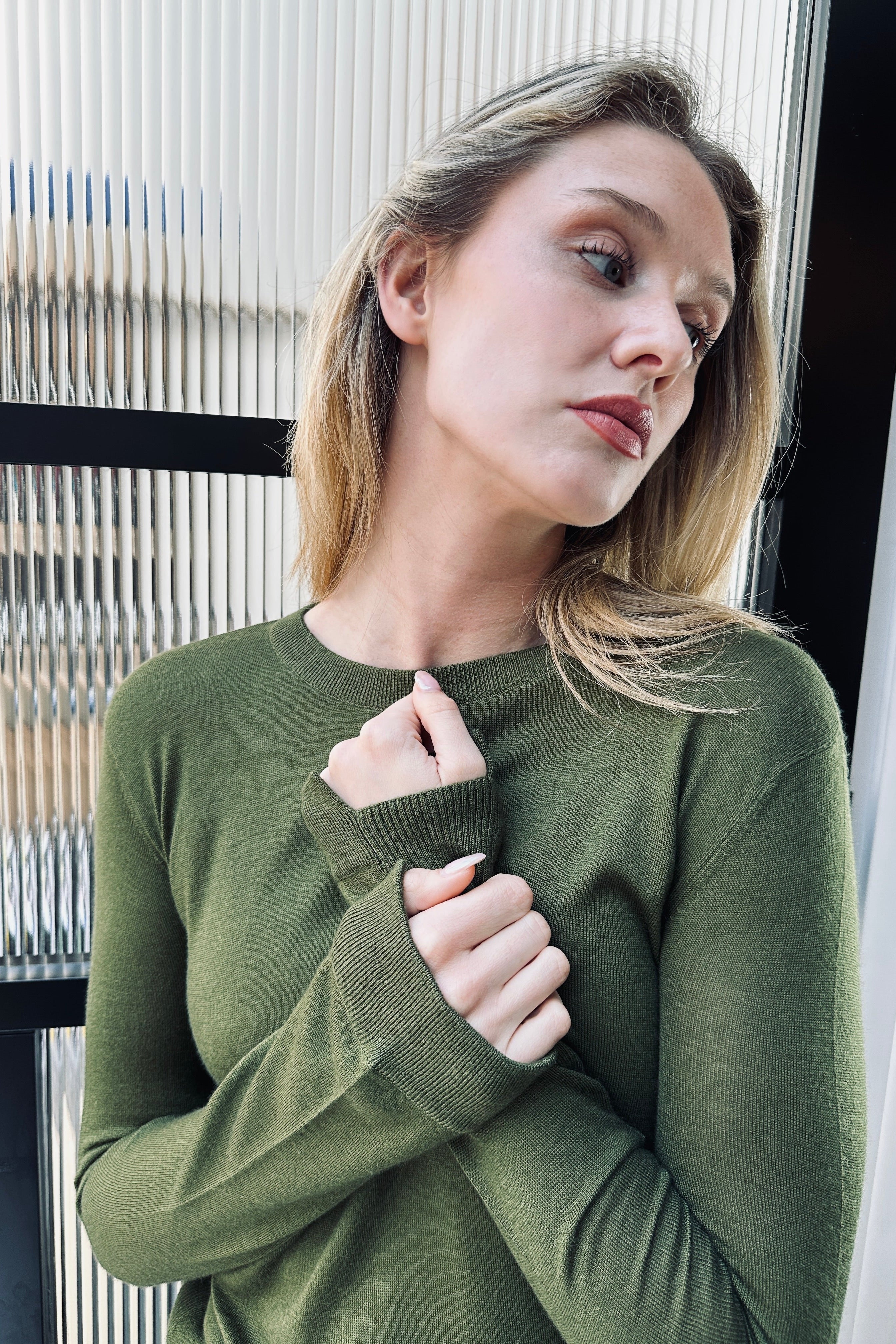 dolly dark green round neck sweater