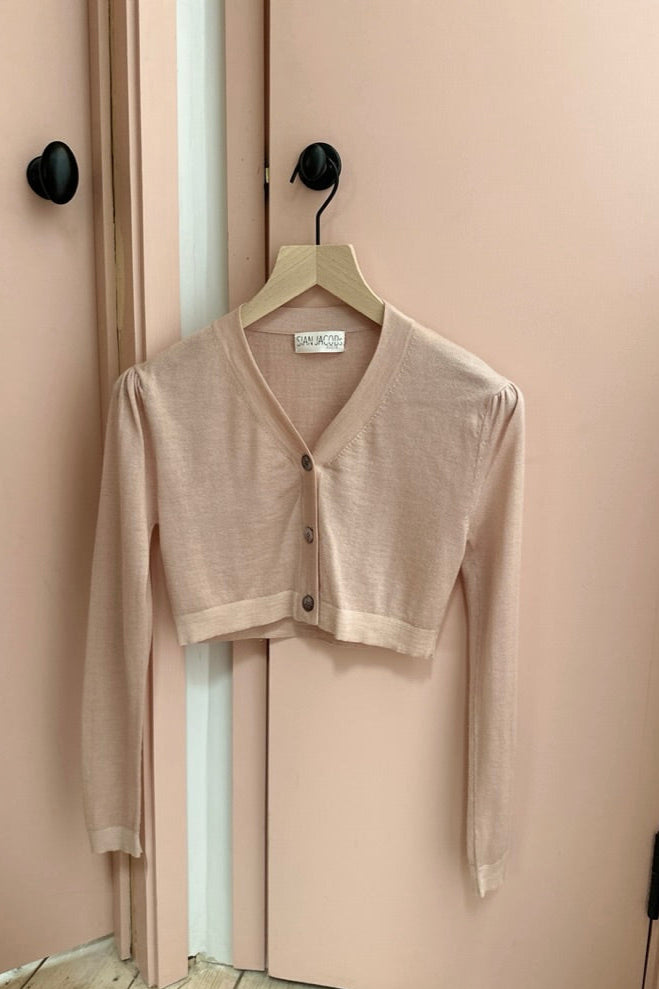 plein short cardi fluff pink colour on door