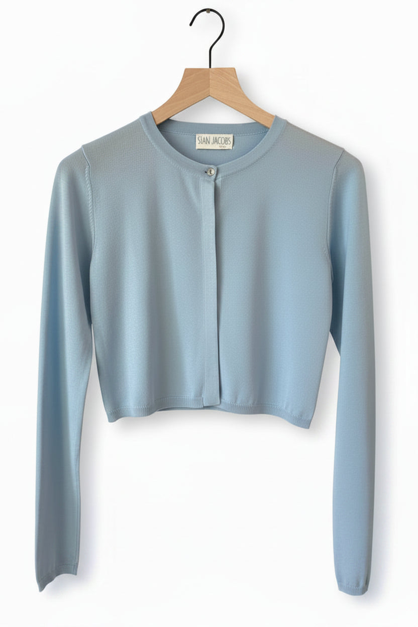 Light blue cardigana on a wooden hanger against a neutral background