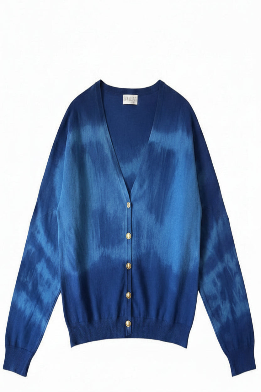 A blue tie-dye cardigan sweater with a V-neck and button closure, flat lay