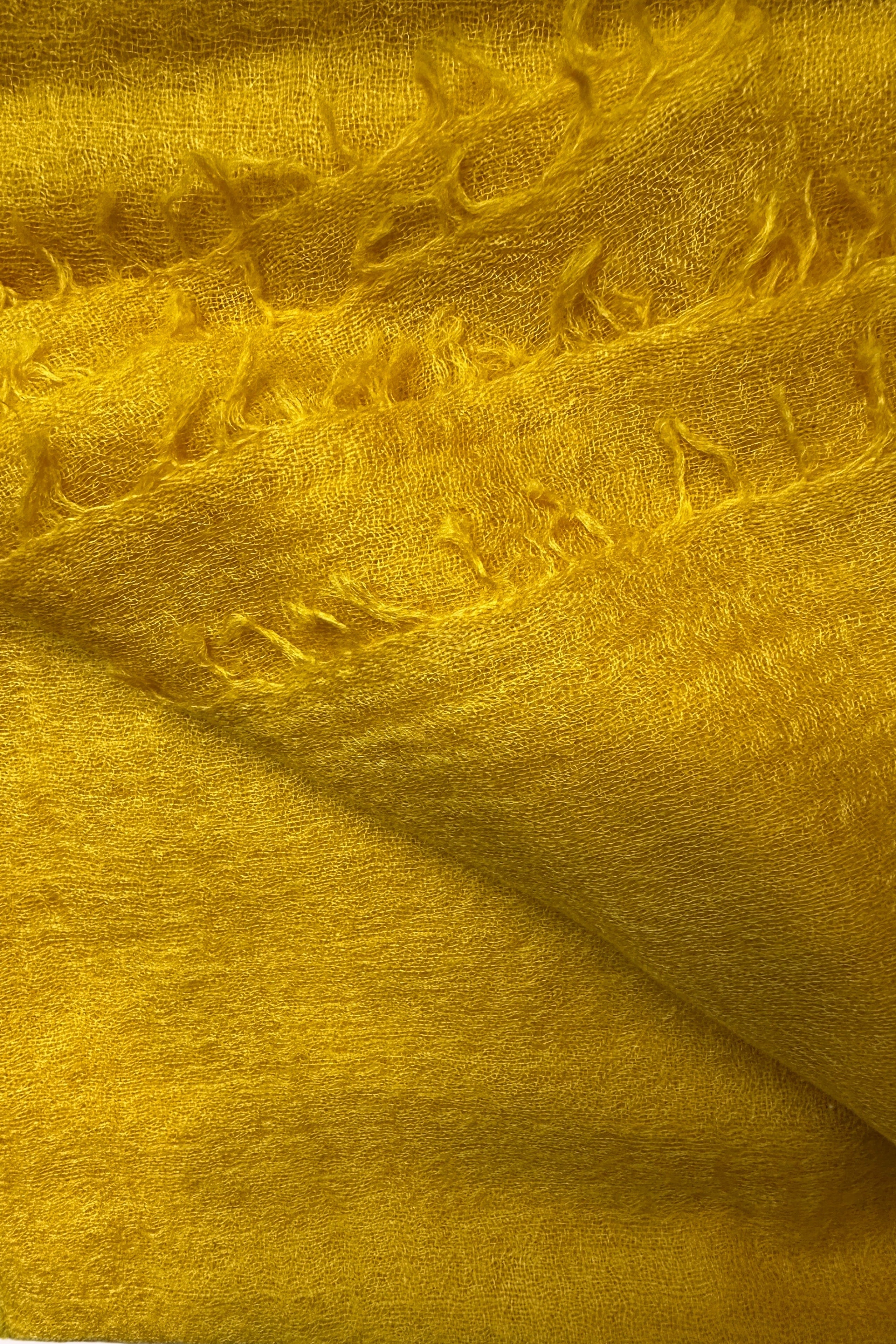 Close-up of yellow mustard marmee scarf