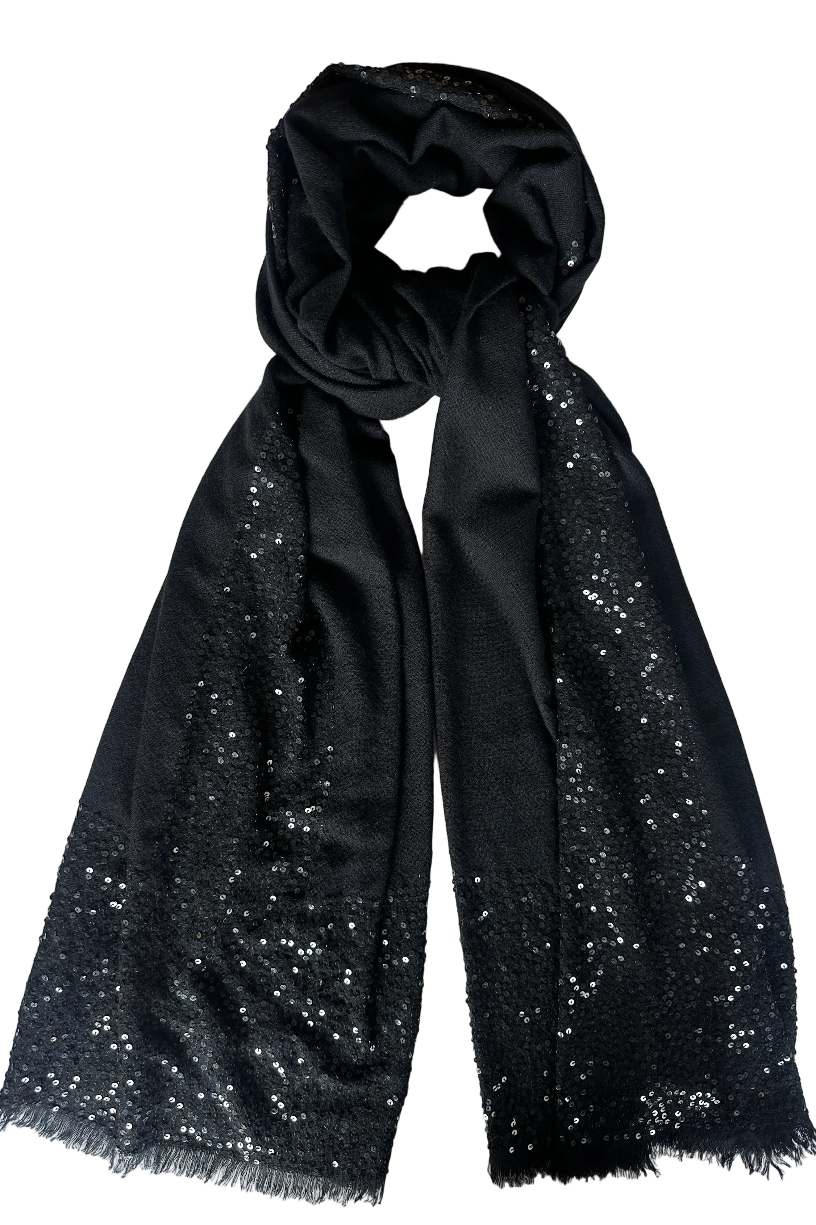flat lay of glimmer scarf black sequins on black cashmere