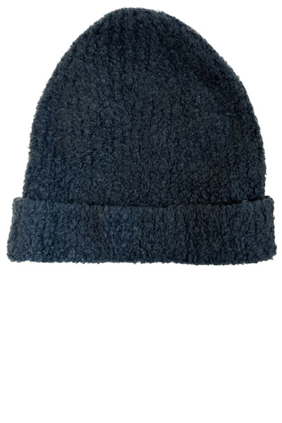 boucle hat teal flat lay