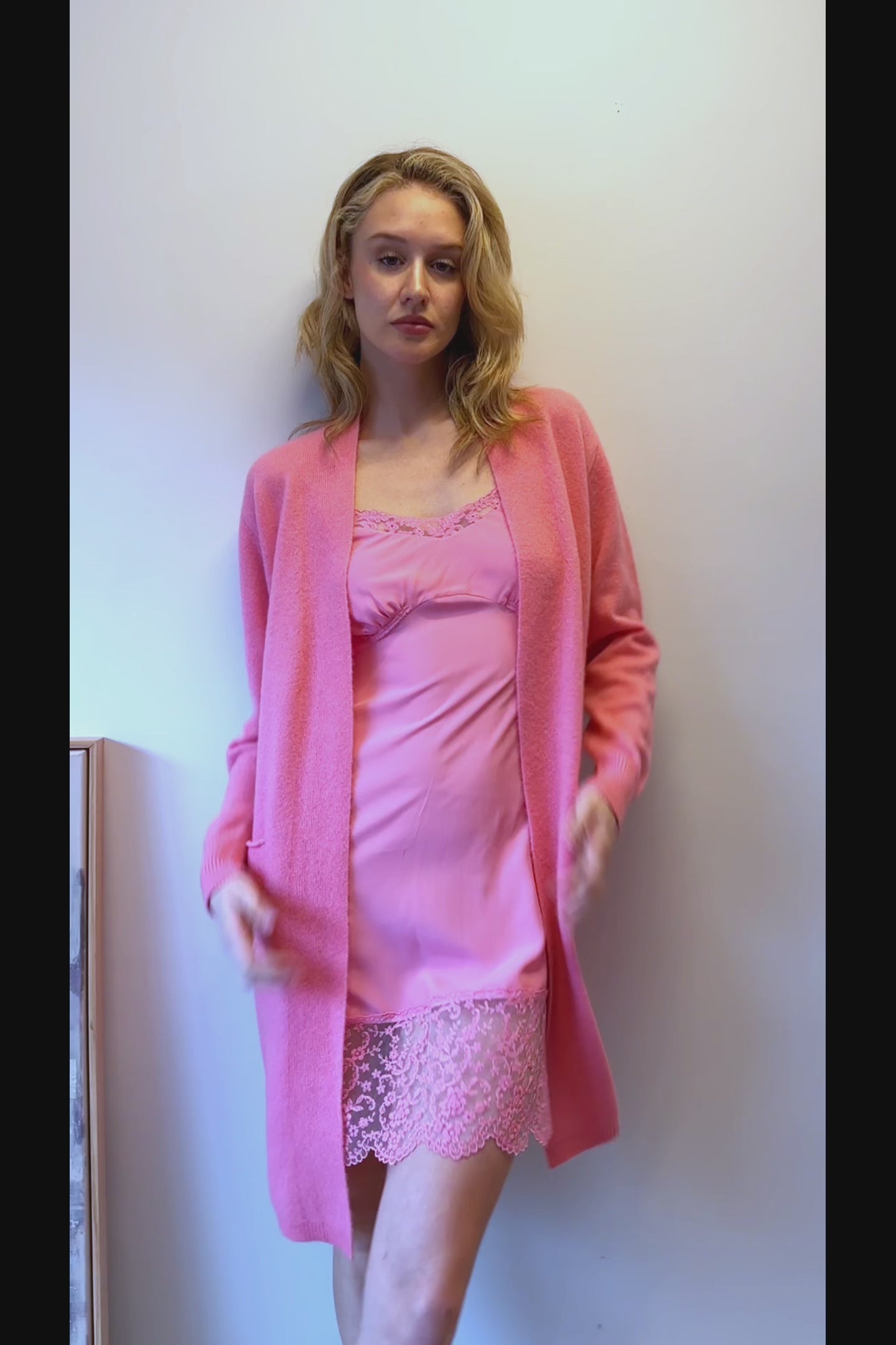 video of Ally long openfront pink cardi