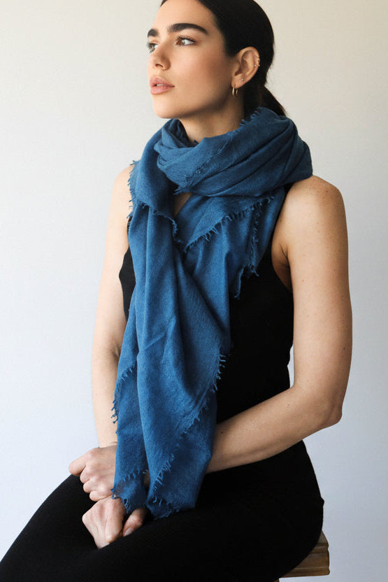 petrol teal blue scarf cashmere on model on stool