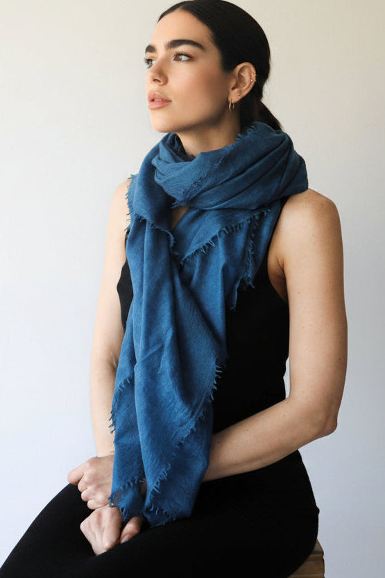 petrol teal blue scarf cashmere on model on stool
