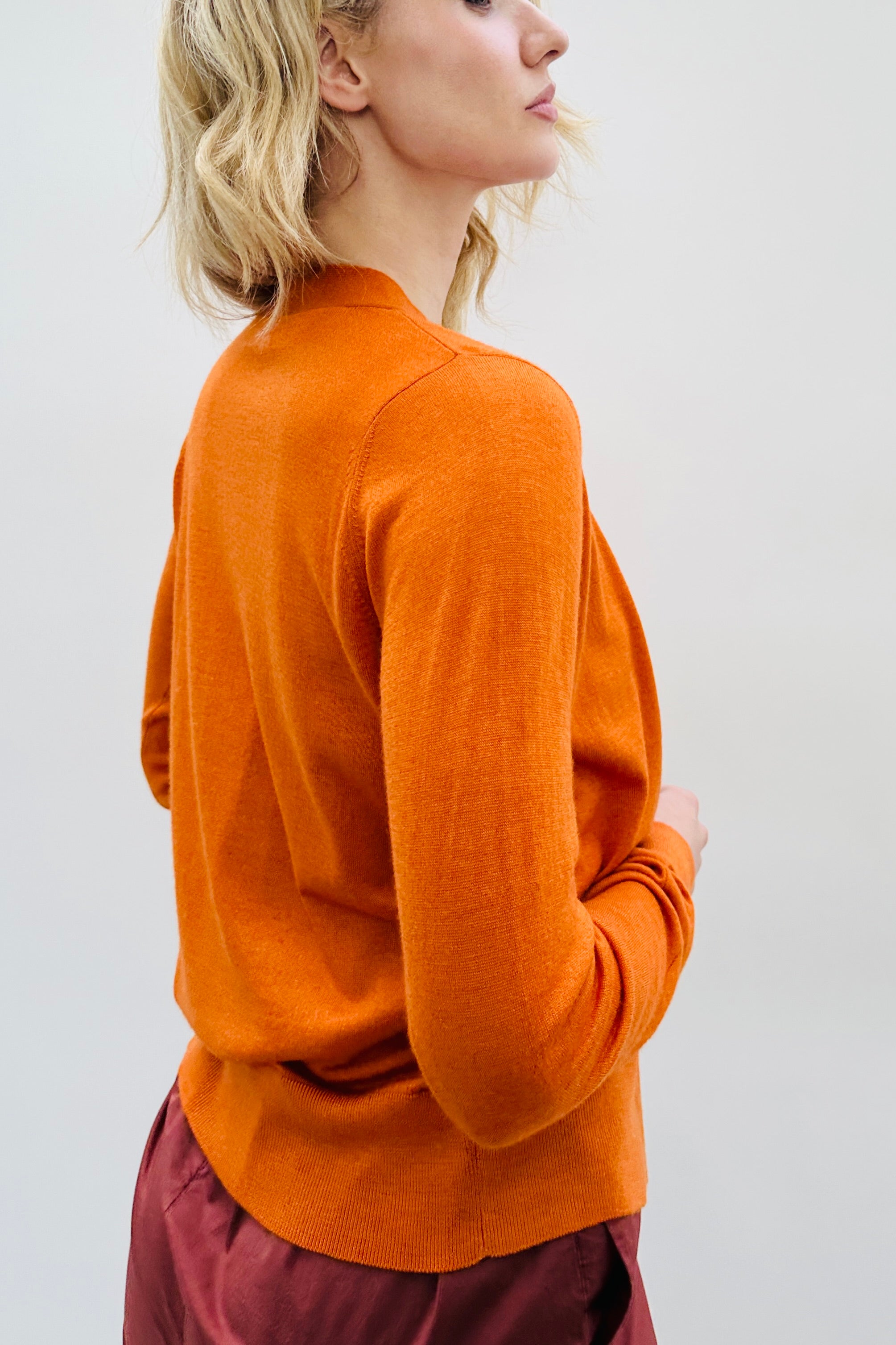 maeser back  view  burnt orange cardigan