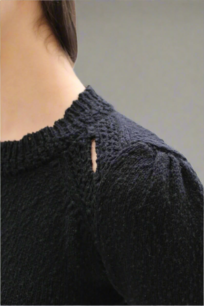 shoulder detail of rainey black slubby cotton sweater