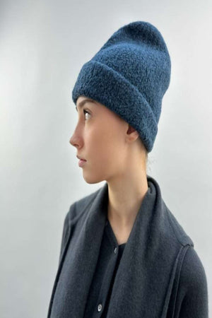 boucle hat teal colour  bobbly