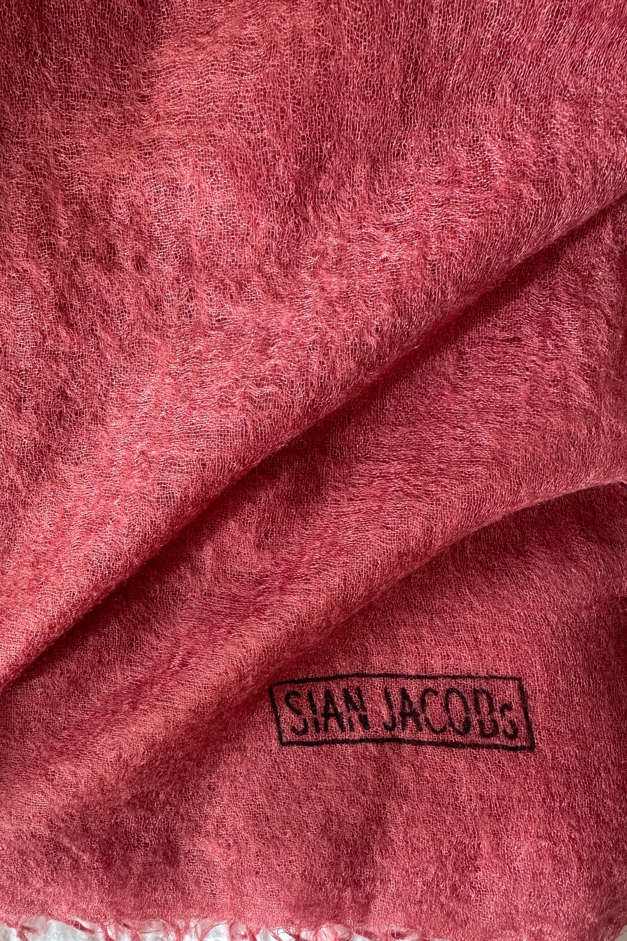 khalo rose pink cashmere swatch with 'Sian Jacobs' logo on a white background