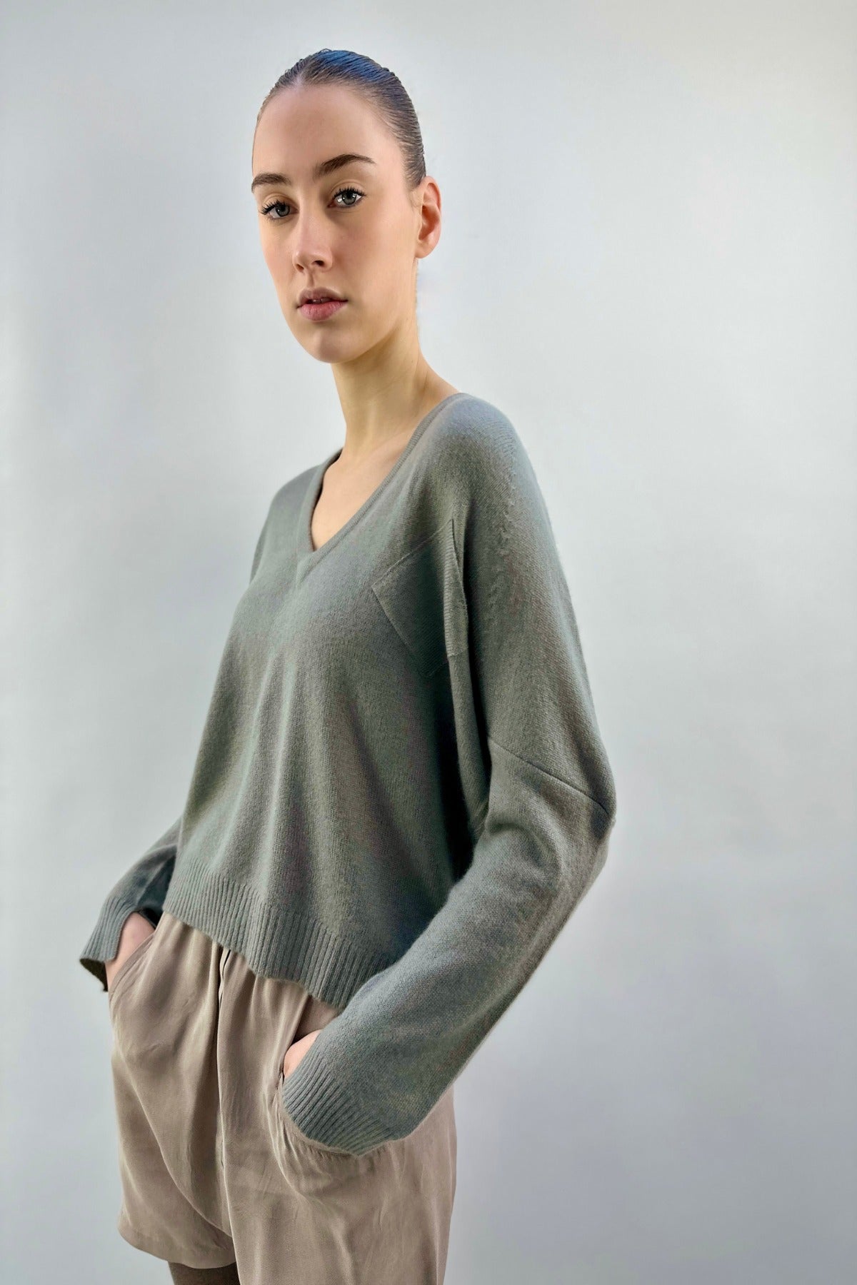 brianna v neck sweater sage green on model