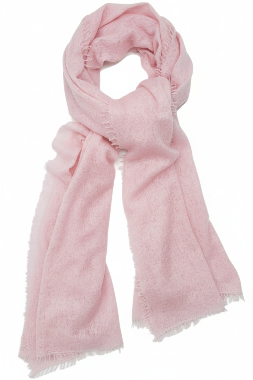A light pastel pink cashmere scarf with felted fringe on all sides, displayed on a white background.