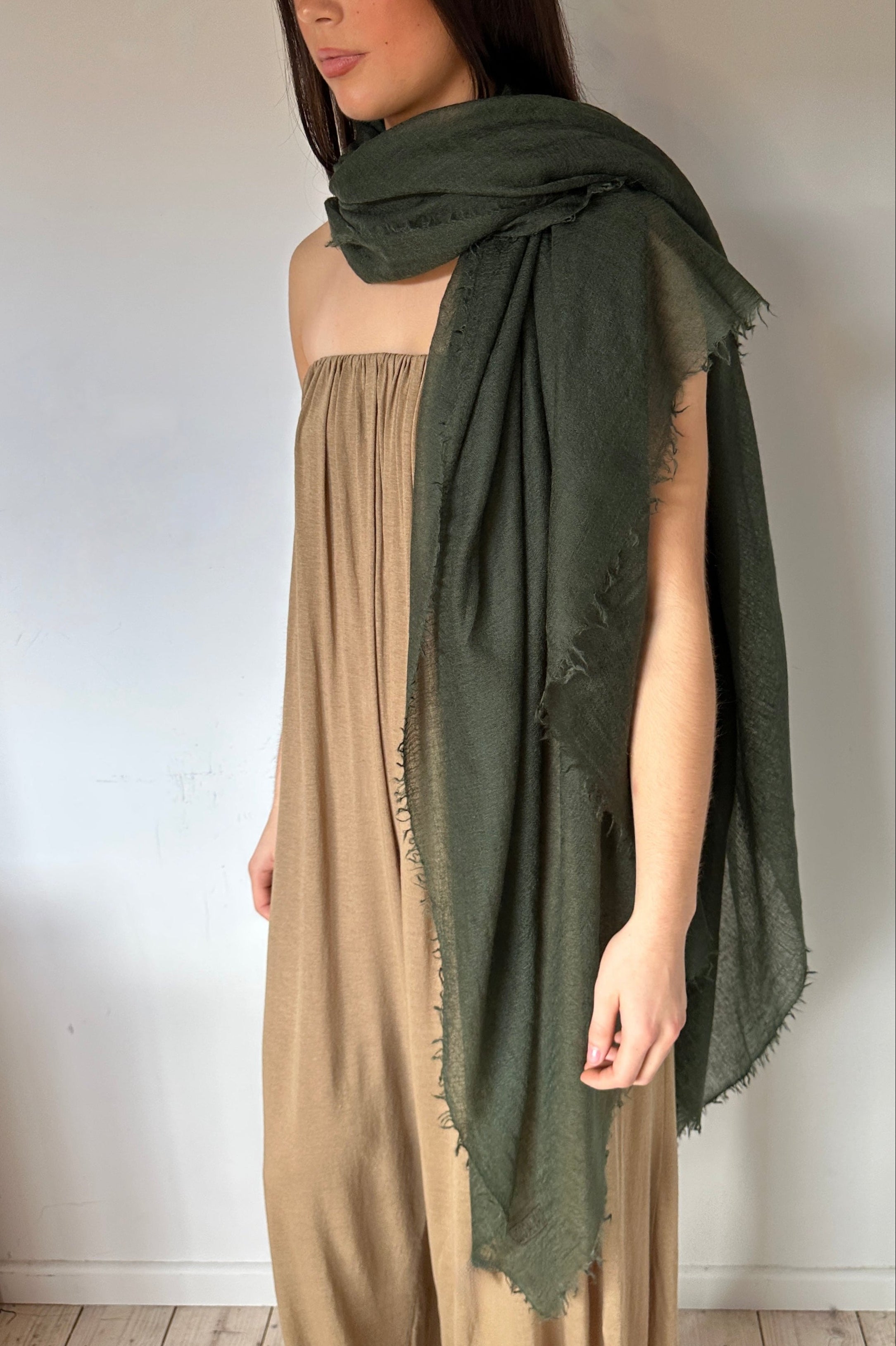 model in dark green marmee cashmere scarf