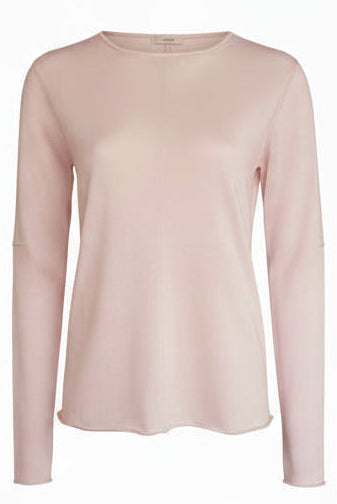 Pink long-sleeve top on a white background